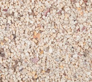 Fiji Pink vs. Oolite: Choosing the Best Marine Aquarium Sand Type 5 A close-up view of CaribSea Special Grade aragonite marine sand, showing the medium-sized white grains used as a stable substrate in saltwater aquariums.